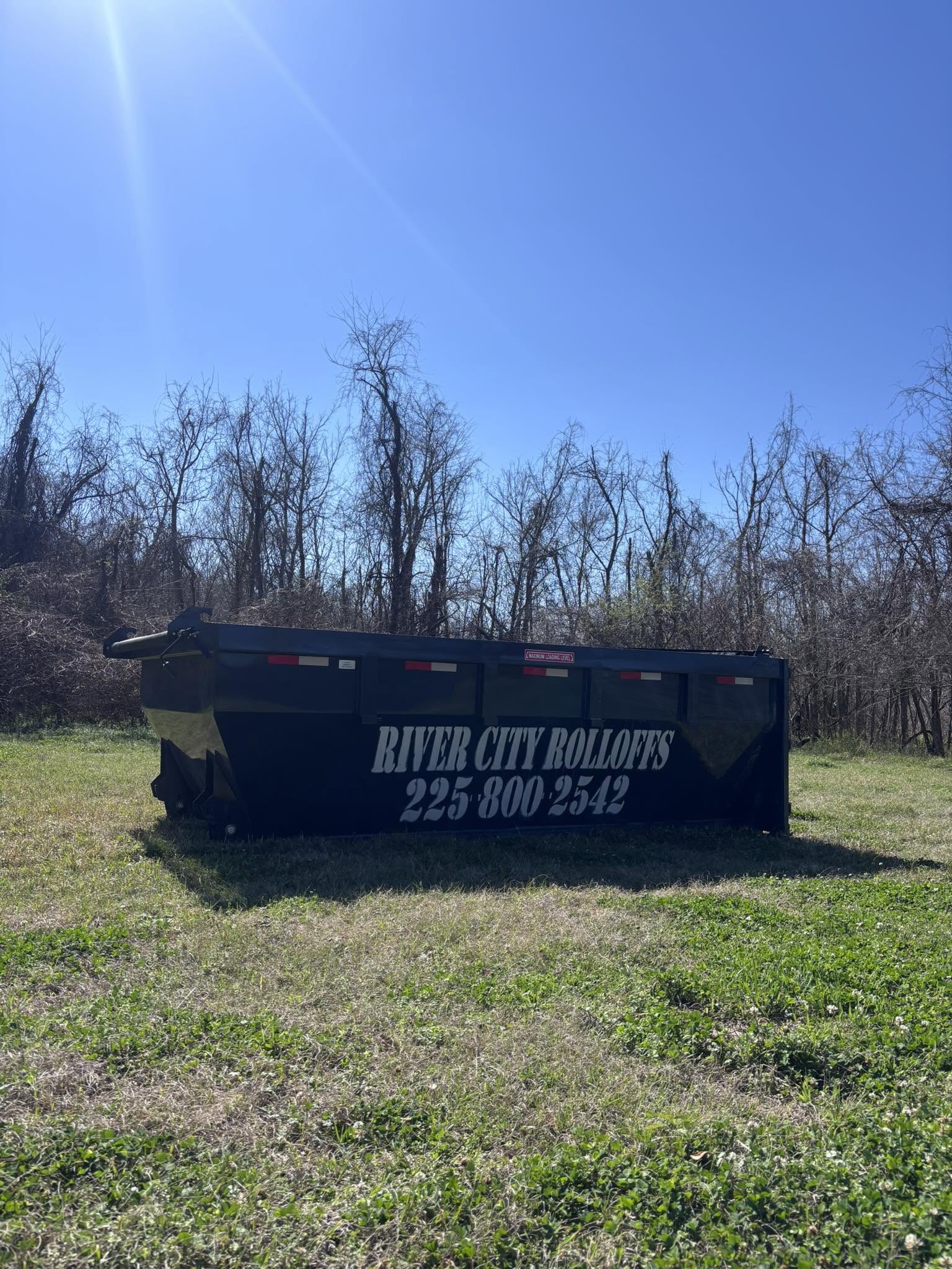 River City dumpster on a local property